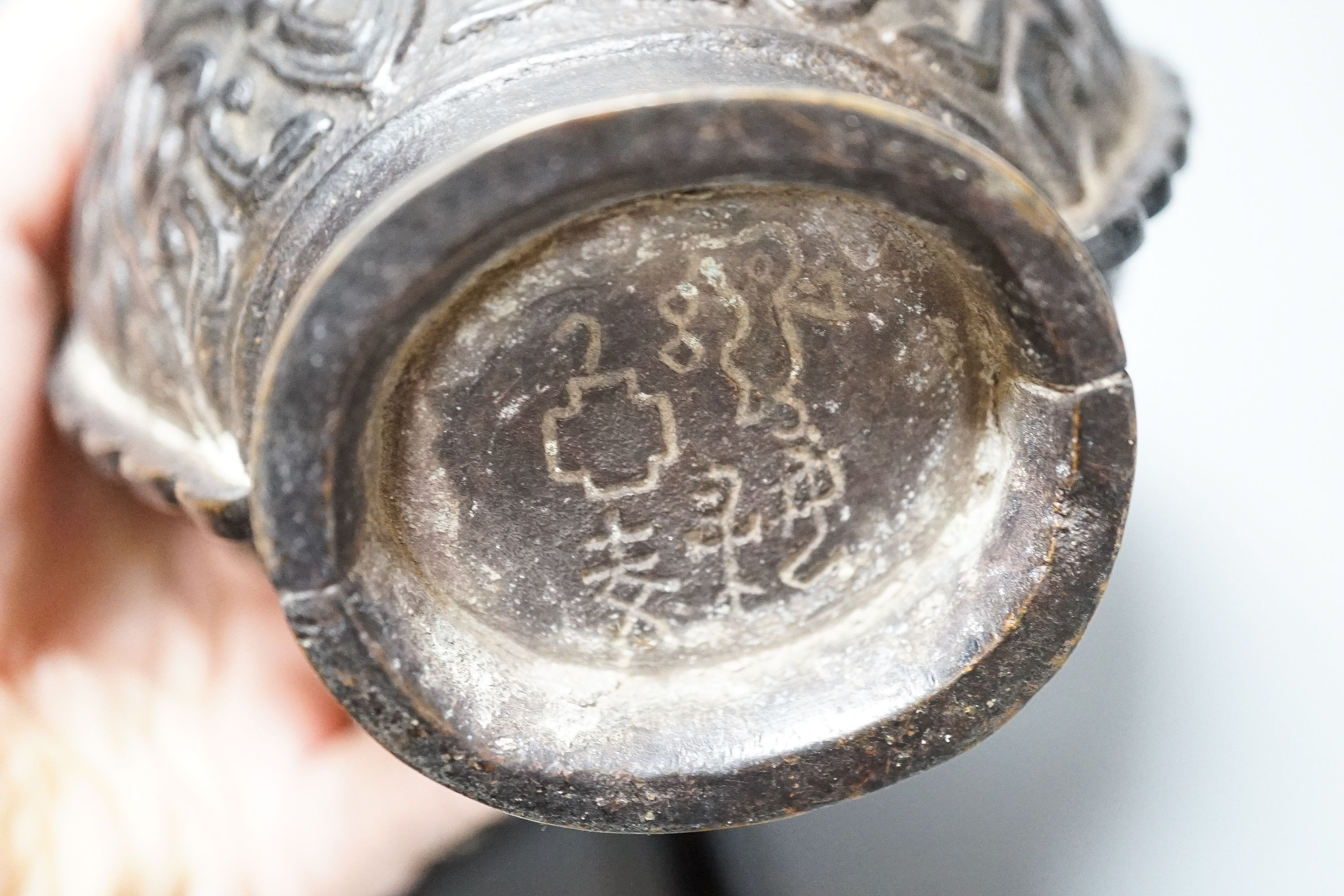 A Chinese archaistic bronze hanging vessel, wood stand 34cm
